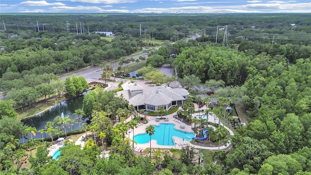 16343 Burniston Dr, Tampa, FL 33647 - aerial view of property's location featuring a pool, a forest, and a large body of water