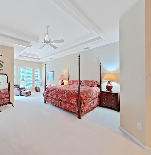 16343 Burniston Dr, Tampa, FL 33647 - carpeted bedroom with a tray ceiling and a ceiling fan