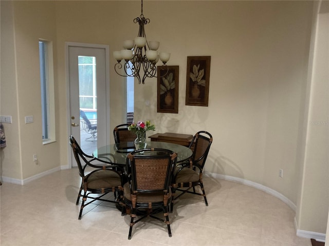 16343 Burniston Dr, Tampa, FL 33647 - dining room featuring a chandelier and baseboards