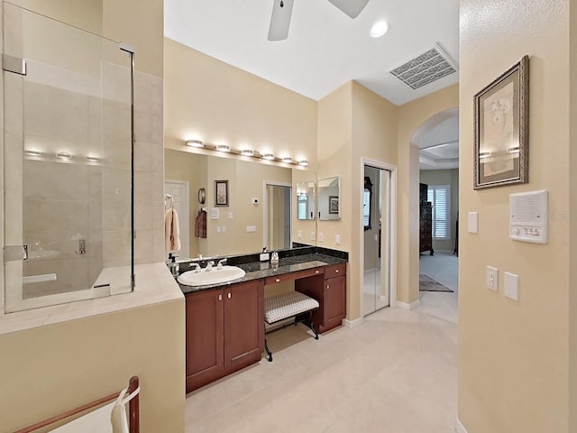 16343 Burniston Dr, Tampa, FL 33647 - full bath with a ceiling fan, vanity, a shower, baseboards, and recessed lighting