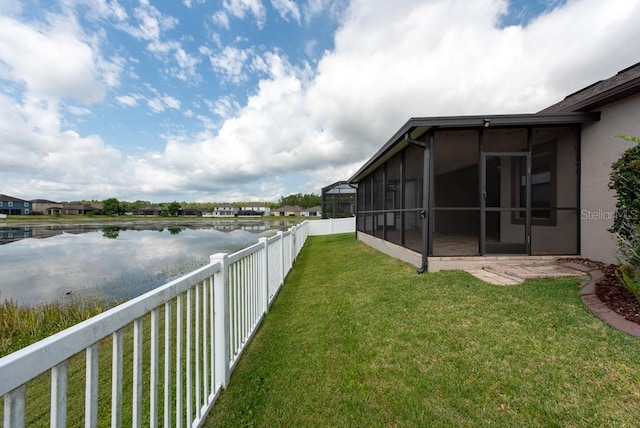 12352 Crestridge Loop, New Port Richey, FL 34655 - view of yard with a sunroom and a water view