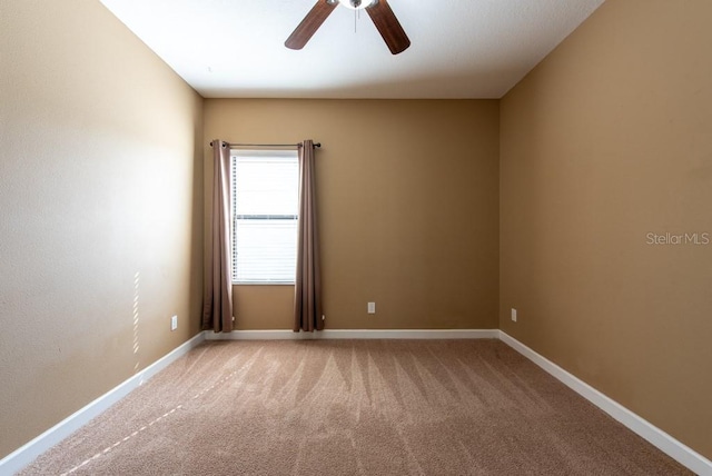 12352 Crestridge Loop, New Port Richey, FL 34655 - unfurnished room with light colored carpet, a ceiling fan, and baseboards