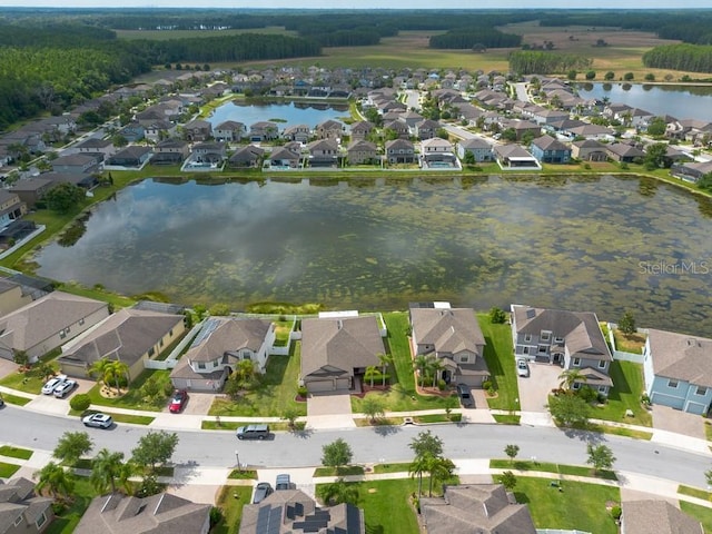 12352 Crestridge Loop, New Port Richey, FL 34655 - aerial view of property and surrounding area featuring nearby suburban area and a large body of water