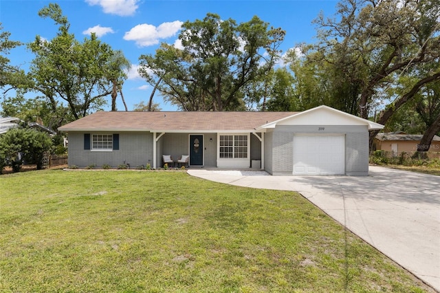3119 W N St, Tampa, FL 33614 - single story home with an attached garage, concrete driveway, and brick siding