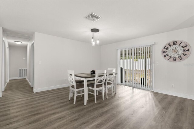 3119 W N St, Tampa, FL 33614 - dining room featuring wood finished floors and baseboards