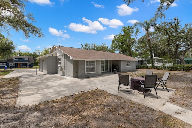 3119 W N St, Tampa, FL 33614 - rear view of property with a patio