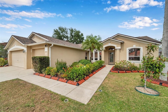815 Sandy Trail Pl, Brandon, FL 33511 - ranch-style house featuring stucco siding, an attached garage, driveway, a front yard, and roof with shingles