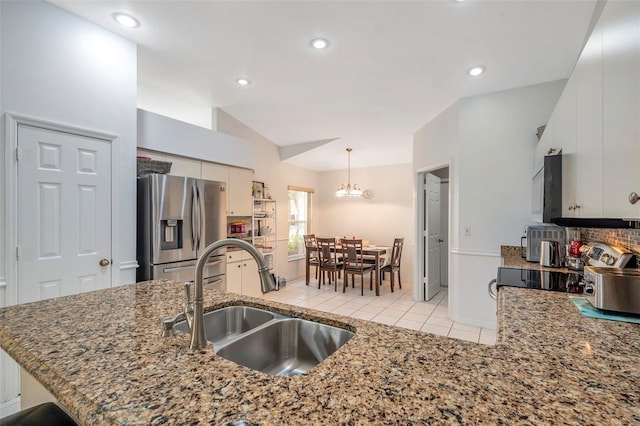815 Sandy Trail Pl, Brandon, FL 33511 - kitchen featuring stainless steel appliances, a sink, tasteful backsplash, recessed lighting, and decorative light fixtures