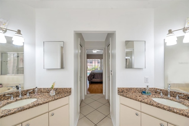 815 Sandy Trail Pl, Brandon, FL 33511 - full bath featuring tile patterned floors, two vanities, and ensuite bath