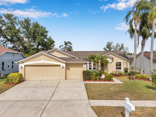 815 Sandy Trail Pl, Brandon, FL 33511 - ranch-style house with stucco siding, an attached garage, concrete driveway, and a front lawn