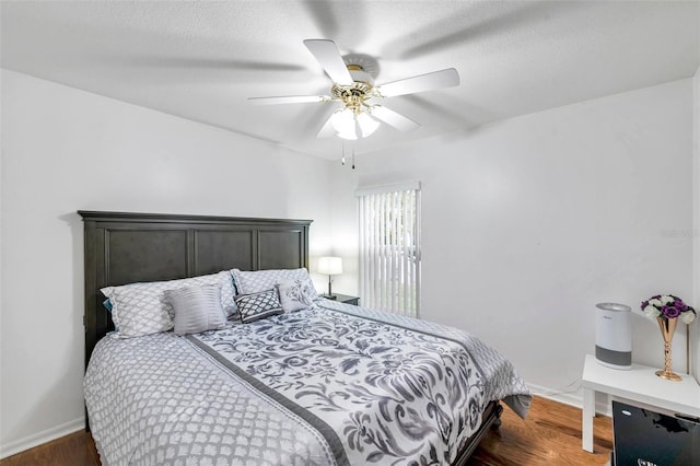 815 Sandy Trail Pl, Brandon, FL 33511 - bedroom with wood finished floors, baseboards, and ceiling fan