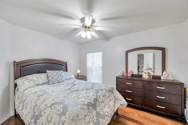 815 Sandy Trail Pl, Brandon, FL 33511 - bedroom with light wood finished floors and ceiling fan