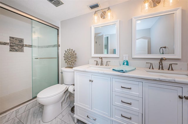 full bath with toilet, double vanity, a shower stall, and marble look tile flooring