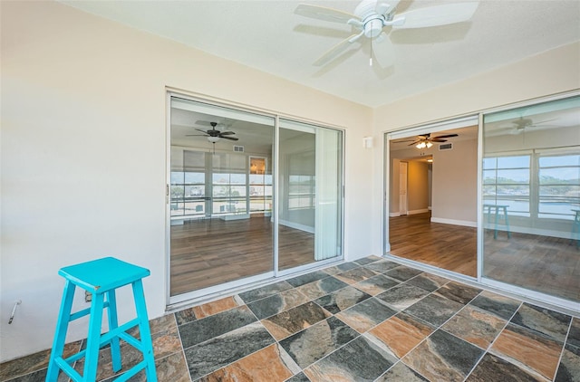 view of patio / terrace with a ceiling fan