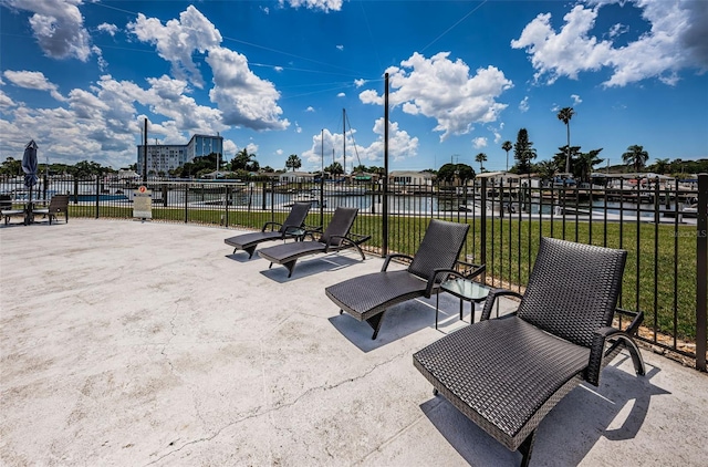view of patio / terrace featuring fence