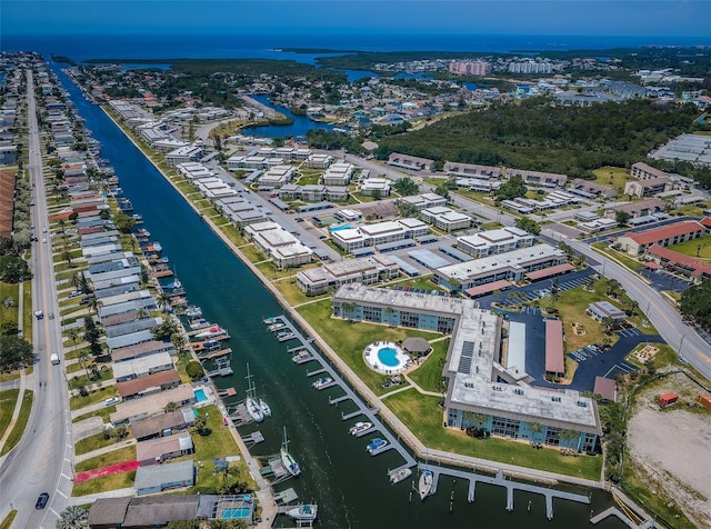 aerial view of property's location featuring a large body of water