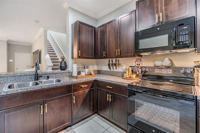 1594 Cassius St, Lutz, FL 33549 - kitchen featuring black appliances, a sink, ornamental molding, light tile patterned floors, and dark brown cabinetry