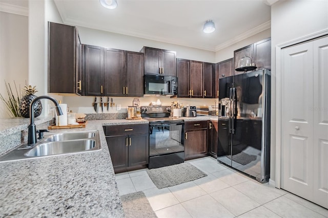 1594 Cassius St, Lutz, FL 33549 - kitchen featuring black appliances, a sink, light countertops, dark brown cabinetry, and ornamental molding