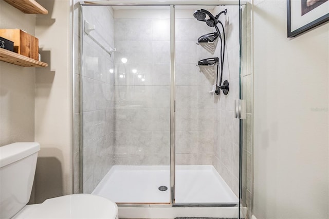 1594 Cassius St, Lutz, FL 33549 - bathroom featuring toilet and a stall shower