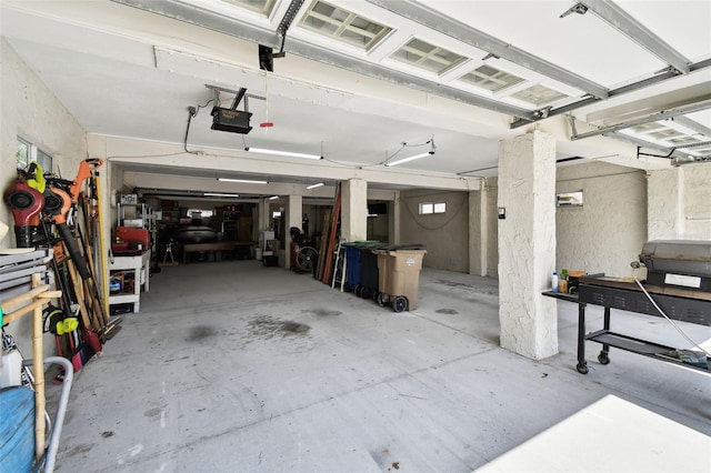 garage featuring a garage door opener