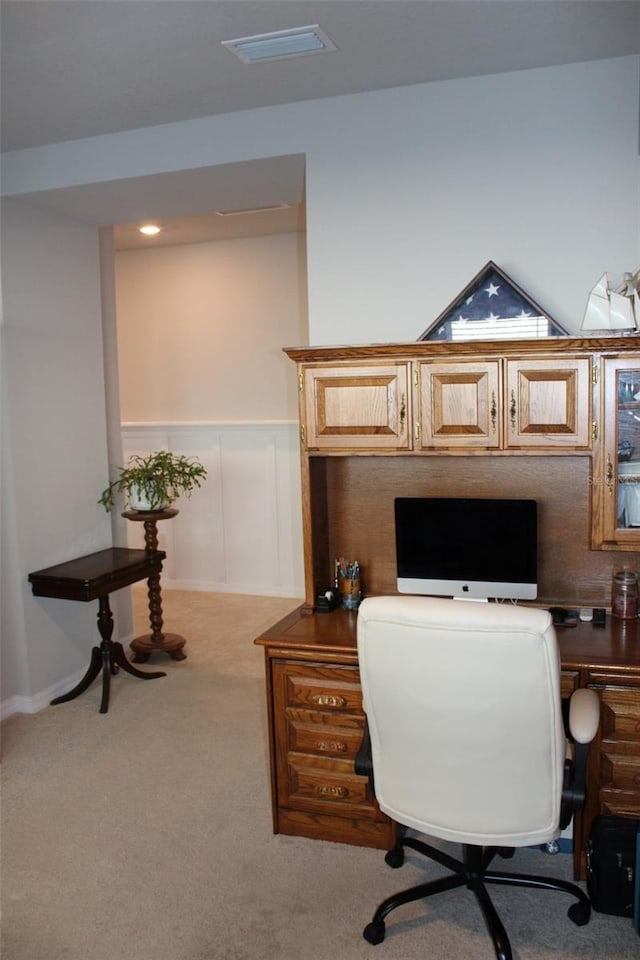 8009 Trimbelle Ter, Parrish, FL 34219 - office area featuring wainscoting, light colored carpet, and built in study area