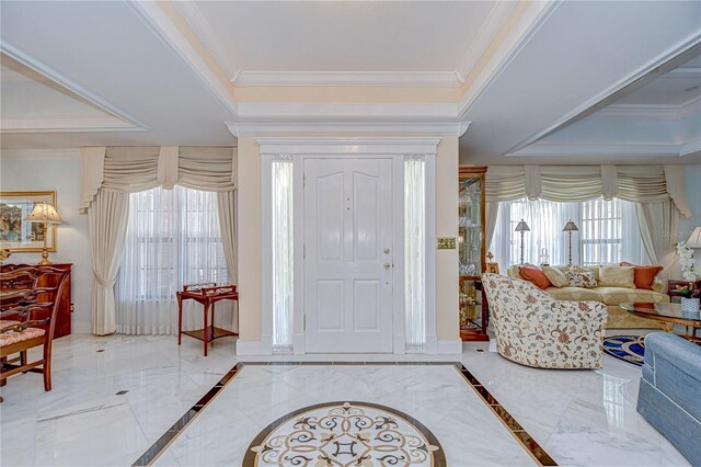 124 Barrington Dr, Brandon, FL 33511 - entryway with a tray ceiling, baseboards, ornamental molding, and marble tiled floors