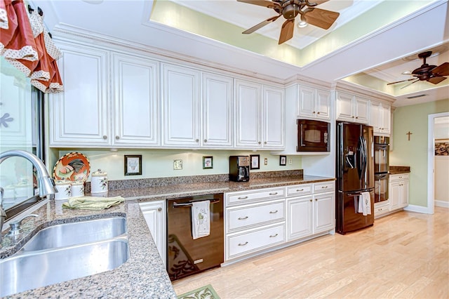 124 Barrington Dr, Brandon, FL 33511 - kitchen featuring a sink, a raised ceiling, a ceiling fan, black appliances, and ornamental molding