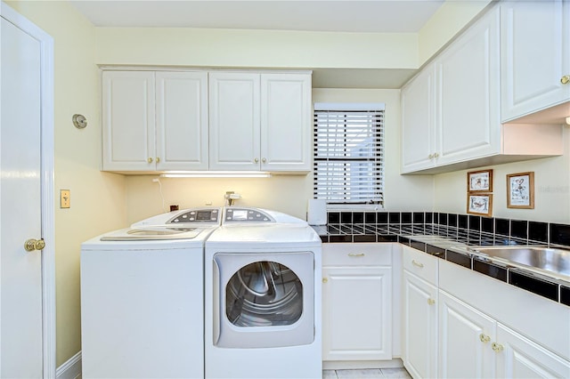 124 Barrington Dr, Brandon, FL 33511 - clothes washing area featuring cabinet space and washer and clothes dryer
