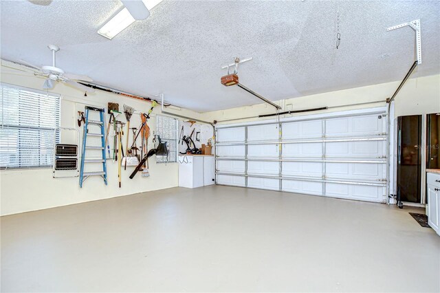 124 Barrington Dr, Brandon, FL 33511 - garage featuring a ceiling fan and a garage door opener
