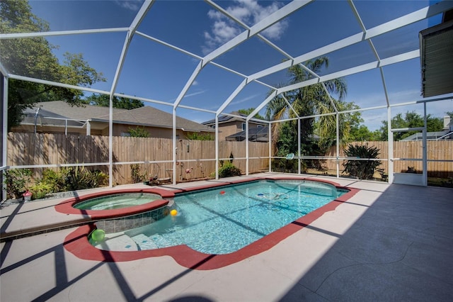 4222 Trumpworth Ct, Valrico, FL 33596 - view of swimming pool featuring a patio area, a fenced backyard, a pool with connected hot tub, and a lanai