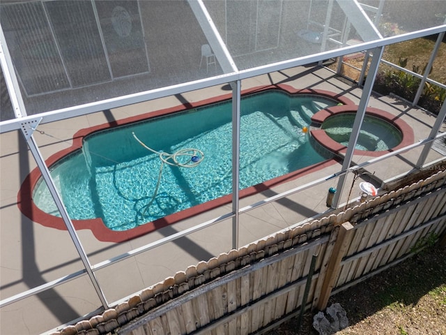 4222 Trumpworth Ct, Valrico, FL 33596 - view of pool featuring glass enclosure and a pool with connected hot tub