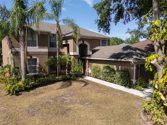 4222 Trumpworth Ct, Valrico, FL 33596 - view of front of home featuring stucco siding and roof with shingles