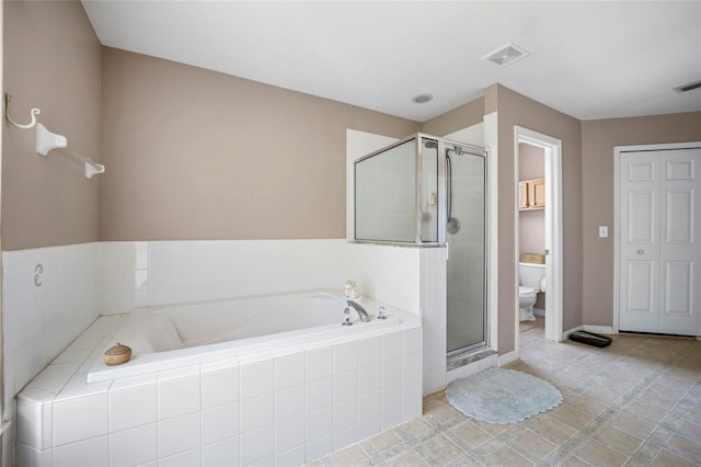 4222 Trumpworth Ct, Valrico, FL 33596 - full bath featuring toilet, a garden tub, a shower stall, and baseboards