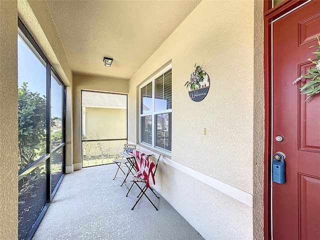 159 Lazy Willow Dr, Davenport, FL 33897 - sunroom / solarium with a textured wall and a textured ceiling