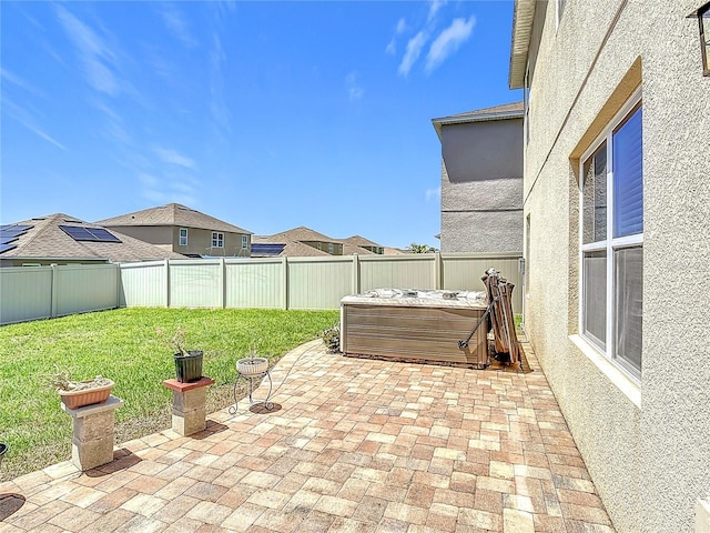 159 Lazy Willow Dr, Davenport, FL 33897 - view of patio / terrace featuring a hot tub