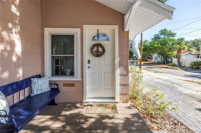 doorway to property with a porch