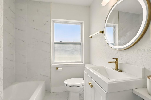 2013 Pineway Dr, Orlando, FL 32839 - bathroom featuring marble look tile flooring, toilet, vanity, and baseboards