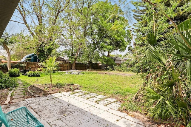 2013 Pineway Dr, Orlando, FL 32839 - view of yard with a patio