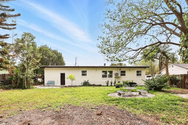 2013 Pineway Dr, Orlando, FL 32839 - rear view of property with stucco siding and a patio