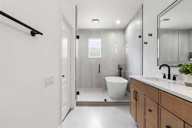 5628 Terrain De Golf Dr, Lutz, FL 33558 - bathroom with a shower stall, vanity, and a freestanding tub
