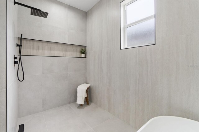 5628 Terrain De Golf Dr, Lutz, FL 33558 - full bath with tiled shower and a freestanding tub