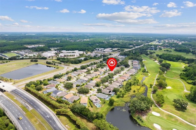 5628 Terrain De Golf Dr, Lutz, FL 33558 - aerial view of property and surrounding area with a large body of water, a golf club, and nearby suburban area
