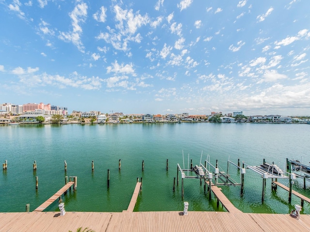 640 Bayway Blvd Unit 302, Clearwater Beach, FL 33767 - dock featuring boat lift and a water view