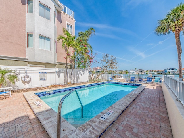 640 Bayway Blvd Unit 302, Clearwater Beach, FL 33767 - community pool featuring fence and a patio
