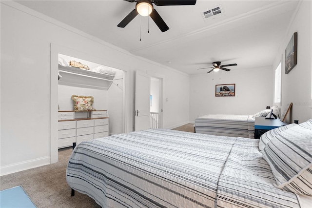 bedroom with carpet flooring, baseboards, ceiling fan, and ornamental molding