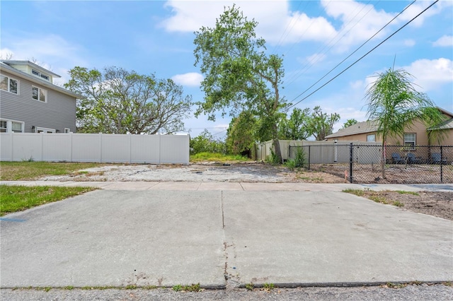 view of patio featuring fence