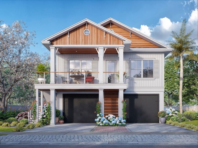 600 Banana St, Tarpon Springs, FL 34689 - view of front facade featuring a balcony, driveway, and a garage