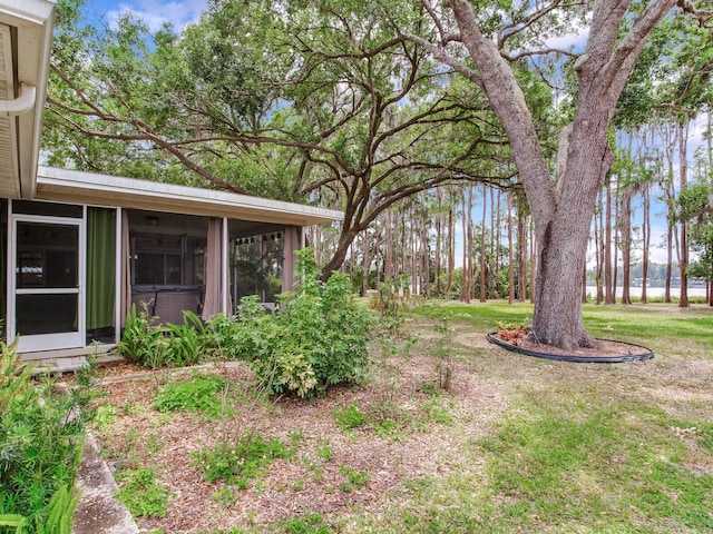 7216 N Mobley Rd, Odessa, FL 33556 - view of yard featuring a sunroom