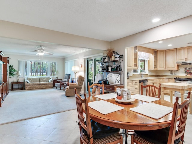 7216 N Mobley Rd, Odessa, FL 33556 - dining space featuring light colored carpet, recessed lighting, light tile patterned floors, a ceiling fan, and a textured ceiling