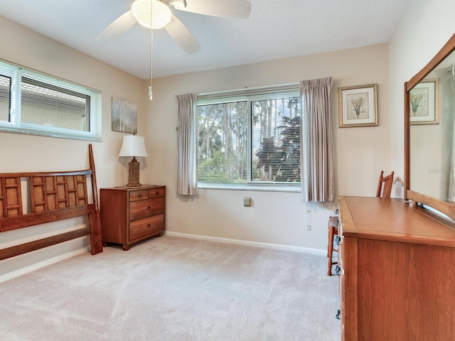 7216 N Mobley Rd, Odessa, FL 33556 - carpeted bedroom featuring baseboards and a ceiling fan